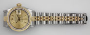 Ladies Rolex DateJust 18K/SS With Champagne Tapesdry Dial 69173