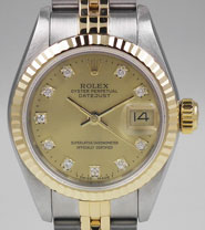 Ladies Rolex DateJust 18K/SS With Diamond-Set Champagne Dial