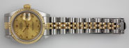 Ladies Rolex DateJust 18K/SS With Champagne Roman Numeral Dial