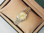 Ladies Rolex DateJust 18K/SS With Champagne Dial 69173