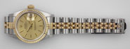 Ladies Rolex DateJust 18K/SS With Champagne Dial 69173