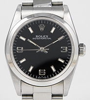 Mid Mid-Size Rolex Oyster Perpetual Black Dial 67480