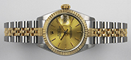 Ladies Rolex Oyster Perpetual 18K/SS Champagne Dial 69173