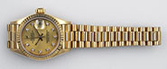 Ladies 18K Rolex Oyster Perpetual DateJust - Factory Champagne Diamond-Set Dial 69178