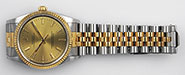 Rolex Oyster Perpetual DateJust 14233 - Metallic Champagne Dial