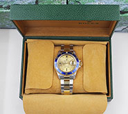Rolex Oyster Perpetual Submariner 18K/SS Champagne Serti Dial Blue Bezel 16613