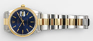 Rolex Oyster Perpetual Date 15223 18K/SS - Original Metallic Blue Dial