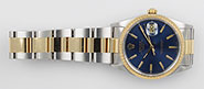 Rolex Oyster Perpetual Date 15223 18K/SS - Original Metallic Blue Dial